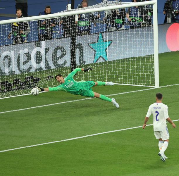 Real Madrid goalkeeper Thibaut Courtois makes a save during the UEFA Champions League final match between Liverpool FC and Real Madrid at Stade de...