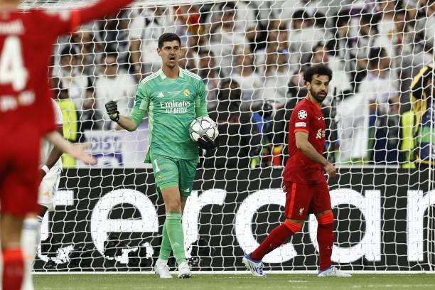 Real Madrid goalkeeper Thibaut Courtois, Mo Salah of Liverpool FC during the UEFA Champions League final match between Liverpool FC and Real Madrid...