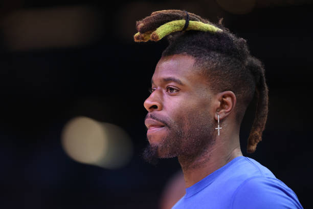 Reggie Bullock of the Dallas Mavericks warms up before Game Two of the Western Conference Second Round NBA Playoffs at Footprint Center on May 04,...
