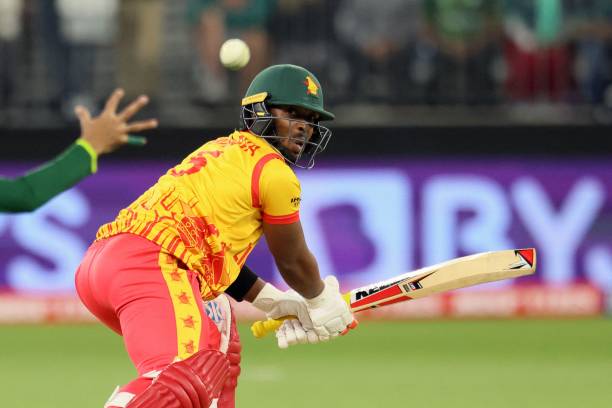 Regis Chakabva of Zimbabwe watches as he is caught by Babar Azam of Pakistan during the ICC mens Twenty20 World Cup 2022 cricket match between...