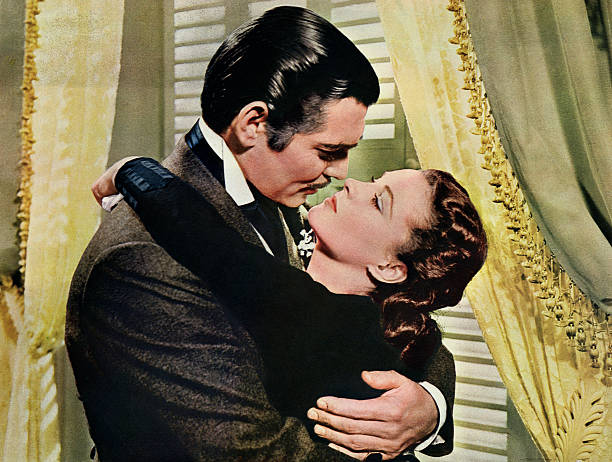 Rhett Butler embraces Scarlett O`Hara in a famous scene from the 1939 epic film Gone with the Wind.