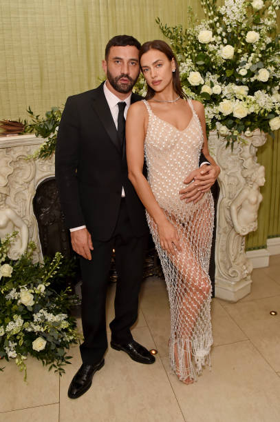 Riccardo Tisci and Irina Shayk attend the British Vogue and Tiffany Co Fashion and Film Party at Annabel's on February 2 2020 in London England