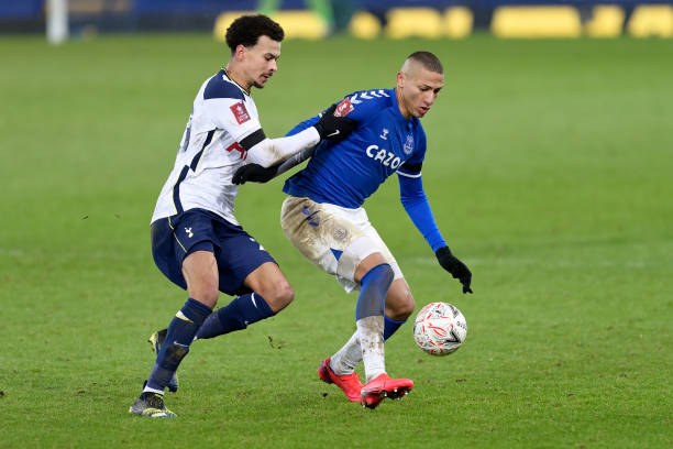 Richarlison of Everton challenges for the ball with Dele Alli during the FA Cup Fifth Round match between Everton and Tottenham Hotspur at Goodison...