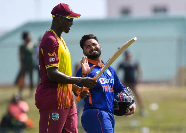 Rishabh Pant , of India, and Jason Holder , of West Indies, at the end of the third T20I match between West Indies and India at Warner Park in...