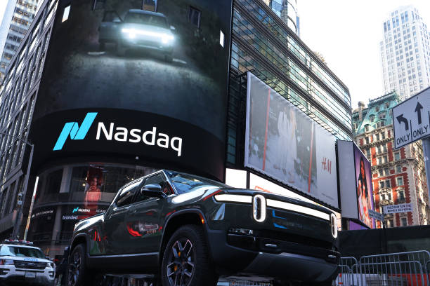 Rivian electric truck is displayed near the Nasdaq MarketSite building in Times Square on November 10, 2021 in New York City. Rivian, an electric...