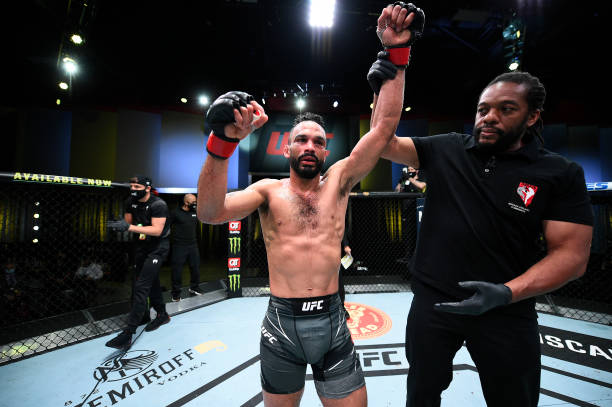 Rob Font reacts after defeating Cody Garbrandt in their bantamweight bout during the UFC Fight Night event at UFC APEX on May 22, 2021 in Las Vegas,...