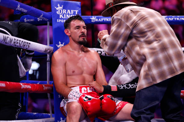 Robert Guerrero is treated in his corner between rounds during his welterweight bout against Victor Ortiz at T-Mobile Arena on August 21, 2021 in Las...