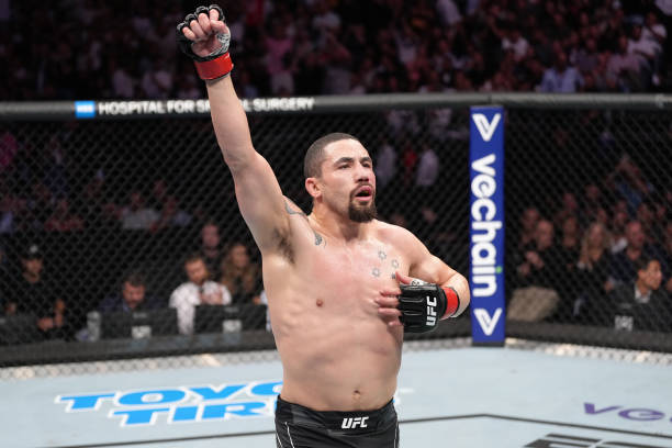 Robert Whittaker of New Zealand reacts after his middleweight fight against Marvin Vettori of Italy during the UFC Fight Night event at The Accor...