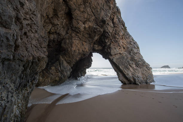 A rock in Portugal,Scenic view of rock formation in sea against sky,Caldas da Rainha,Leiria,Portugal