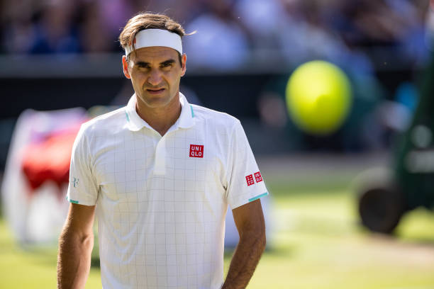 Roger Federer of Switzerland in action during the Men's Singles Quarter Final against Hubert Hurkacz of Poland at The Wimbledon Lawn Tennis...