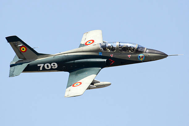 Romanian Air IForce AR-99 Soim jet trainer and light attack aircraft in flight over Romania.