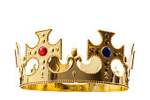 Royal gold, regal attire and royalty concept theme with a king s golden crown isolated on white background with a clip path cutout