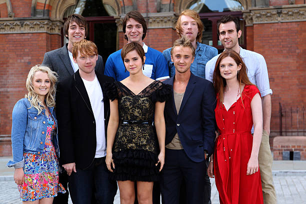 Rupert Grint, Emma Watson, Tom Felton, James Phelps, Oliver Phelps and Bonnie Wright attend a photocall for Harry Potter and the Deathly Hallows at...