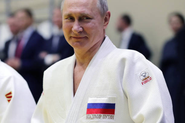 Russian President Vladimir Putin takes part in a training session with members of the Russian national judo team in Sochi on February 14, 2019.