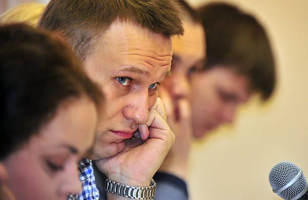 Russian protest leader Alexei Navalny attends the hearing of his case in a court in the provincial northern city of Kirov, on April 25, 2013. A...