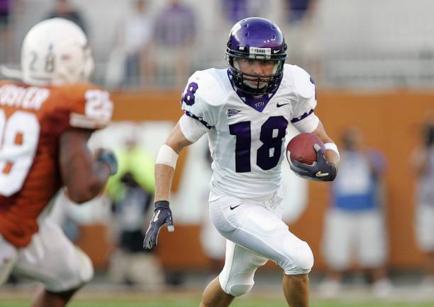 ryan-christian-of-the-tcu-horned-frogs-runs-for-yardage-during-their-picture-id76774463