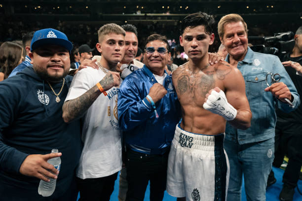 Ryan Garcia poses with his team after defeating Javier Fortuna during their Super Light weight 12 rounds fight at Crypto.com Arena on July 16, 2022...