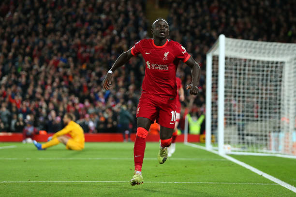 Sadio Mane of Liverpool celebrates after scoring a goal to make it 2-0 during the UEFA Champions League group B match between Liverpool FC and...