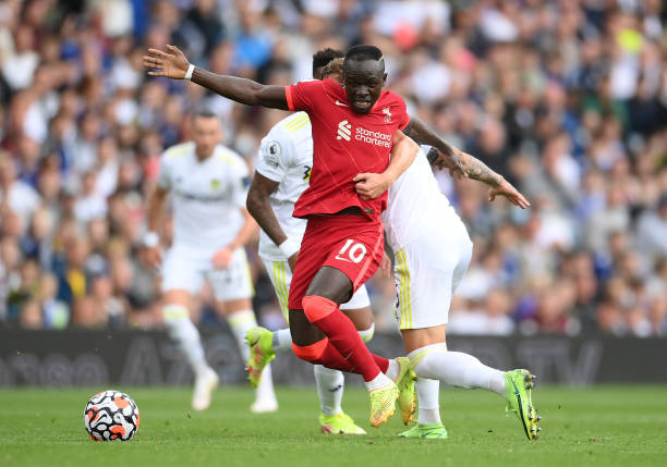 Sadio Mane of Liverpool is fouled by Liam Cooper of Leeds United during the Premier League match between Leeds United and Liverpool at Elland Road on...