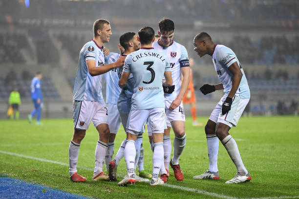 Said Benrahma celebrates with teammates Declan Rice, Aaron Cresswell and Issa Diop of West Ham United United after scoring their team's second goal...