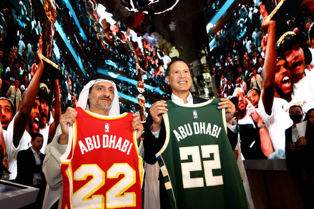 Saleh Mohamed Al Geziry, Director General for Tourism at DCT Abu Dhabi and Ralph Rivera, Managing Director, NBA Europe and Middle East pose for a...