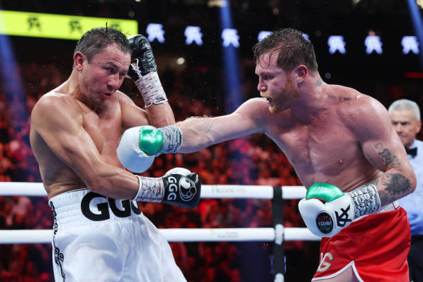 Saul &quot;Canelo&quot; Alvarez, right, throws a punch against Gennadiy &quot;GGG&quot; Golovkin, in the tenth round of a super middleweight title...