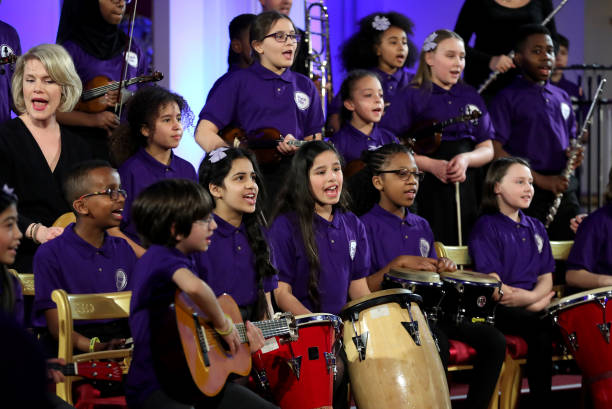 A school choir performs as Catherine Duchess of Cambridge hosts a Gala Dinner in celebration of the 25th anniversary of Place2Be at Buckingham Palace...