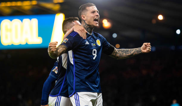 Scotland's Lyndon Dykes celebrates making it 2-0 during a UEFA Nations League match between Scotland and Ukraine at Hampden Park, on September 21 in...