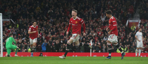 Scott McTominay of Manchester United celebrates scoring their first goal during the Premier League match between Manchester United and Burnley at Old...