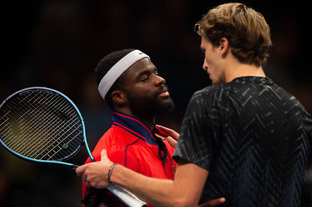 Second placed Frances Tiafoe from the US and winner Germany's Alexander Zverev shake hands after the men's singles final match at the Erste Bank Open...