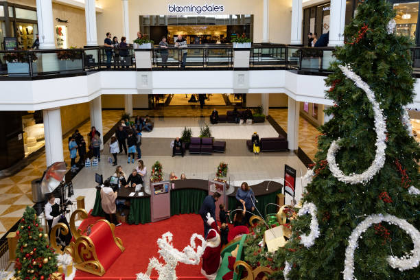 section for shoppers to take photographs with a santa claus performer picture