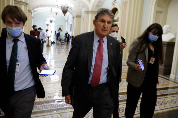 Sen. Joe Manchin arrives for the Senate Democratic policy luncheon at the U.S. Capitol on December 14, 2021 in Washington, DC. The Senate is working...