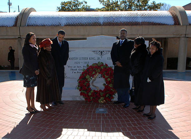 Senator Barack Obama , lays a wreath at the grave of Martin Luther King's grave with members of King's family January 20, 2008 in Atlanta, Georgia....