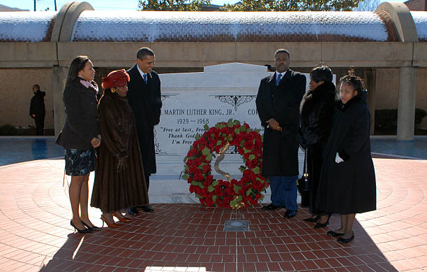 Senator Barack Obama , lays a wreath at the grave of Martin Luther King's grave with members of King's family January 20, 2008 in Atlanta, Georgia....