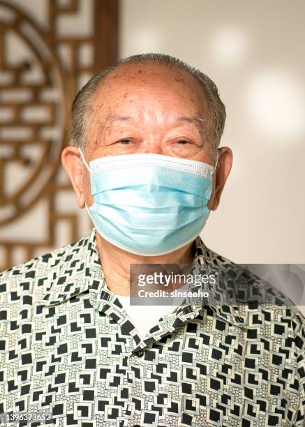 senior asian man chinese ethnicity wearing