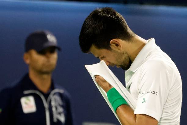 Serbia's Novak Djokovic reacts to his defeat by Czech Republic's Jiri Vesely during their quarter-final match at the ATP Dubai Duty Free Tennis...