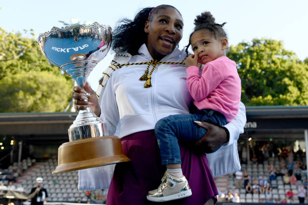Serena Williams of the USA celebrates with daughter Alexis Olympia after winning the final match against Jessica Pegula of USA at ASB Tennis Centre...