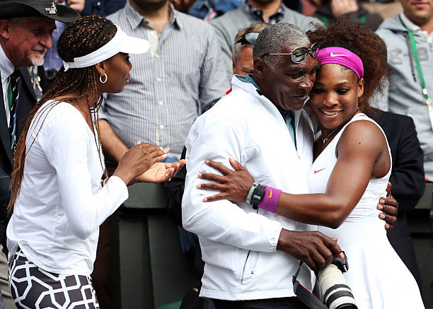Serena Williams of the USA celebrates with her father Richard Williams and sister Venus Williams after her Ladies’ Singles final match against...