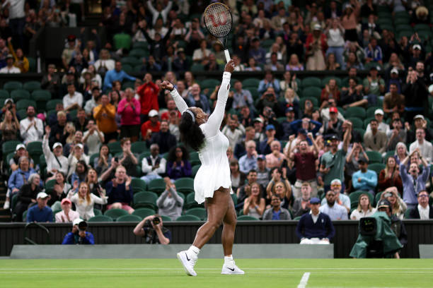 Serena Williams of United States celebrates breaking serve against Harmony Tan of France during their Women's Singles First Round Match on day two of...