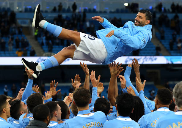 Sergio Aguero of Manchester City gets thrown in the air after the Premier League match between Manchester City and Everton at Etihad Stadium on May...