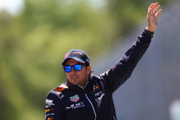 Sergio Perez of Mexico and Oracle Red Bull Racing waves to the crowd on the drivers parade ahead of the F1 Grand Prix of Canada at Circuit Gilles...