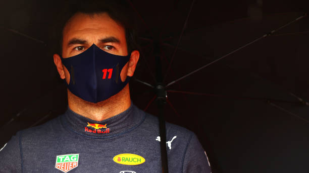 Sergio Perez of Mexico and Red Bull Racing prepares to drive on the grid before the F1 Grand Prix of Hungary at Hungaroring on August 01, 2021 in...