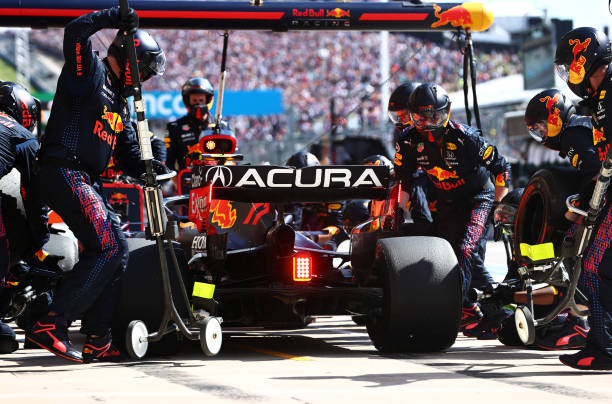 Sergio Perez of Mexico driving the Red Bull Racing RB16B Honda makes a pitstop during the F1 Grand Prix of USA at Circuit of The Americas on October...
