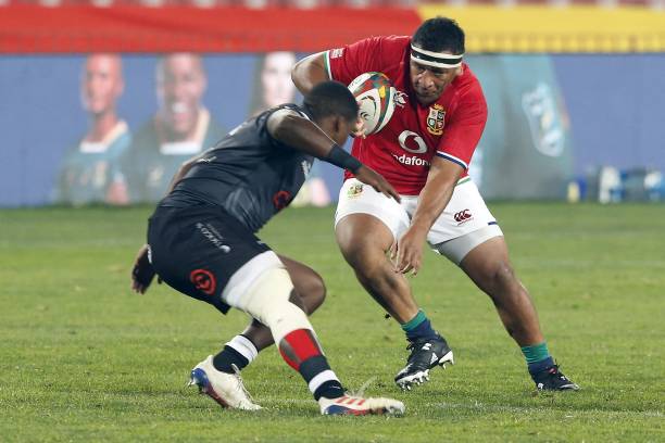 Sharks' hooker Fez Mbatha (L) tackles British and Irish Lions' prop Mako Vunipola (R) during a rugby union tour match between the Sharks against the British and Irish Lions at the Ellis Park stadium in Johannesburg on July 7, 2021. (Photo by Phill Magakoe / AFP) (Photo by PHILL MAGAKOE/AFP via Getty Images)