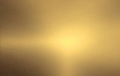 Shiny brushed gold color metal background