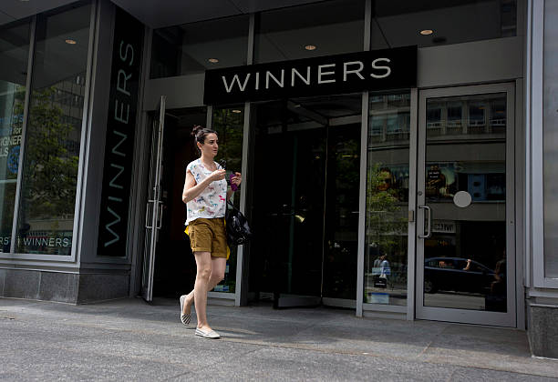 shopper exits a winners store on bloor street in toronto ontario on picture
