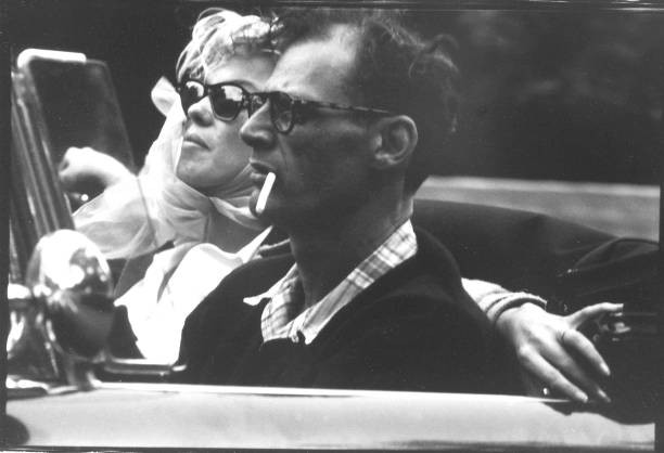 Shortly after their marriage, American actress Marilyn Monroe and American playwright Arthur Miller ride in a Thunderbird convertible with Monroe`s...