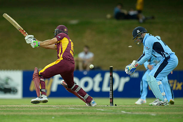 simon-milenko-of-queensland-is-bowled-out-by-steve-okeefe-of-nsw-the-picture-id492899406