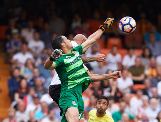 Simone Zaza of Valencia CF and Andres Fernandez of Villarreal CF during their La Liga match between Valencia CF and Villarreal CF at the Mestalla...