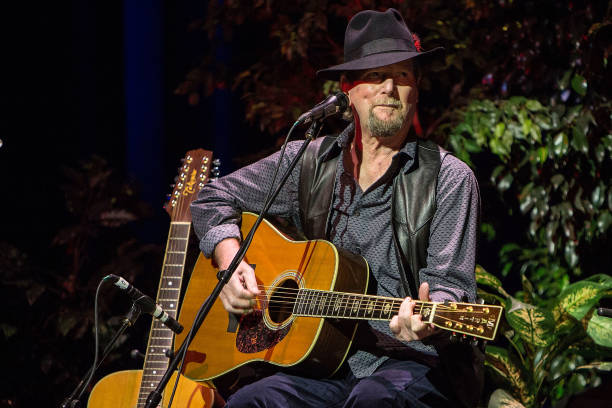 singersongwriter-roger-mcguinn-performs-on-stage-at-poway-center-for-picture-id858903518